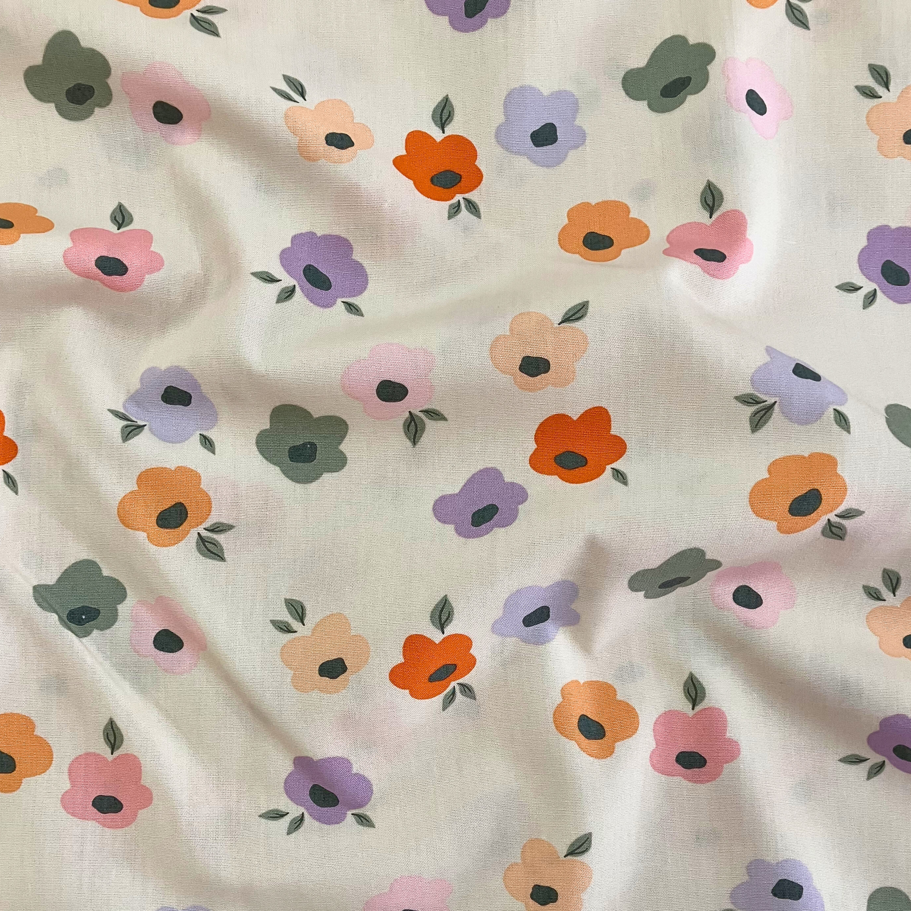 100% cotton quilting fabric — Pastel-coloured flowers on cream. 44/45in width.