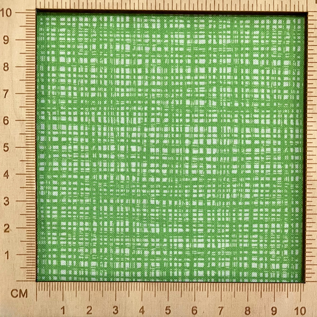 4"x4" scale — 100% cotton quilting fabric — Intersecting bright green lines. 43/44in width.