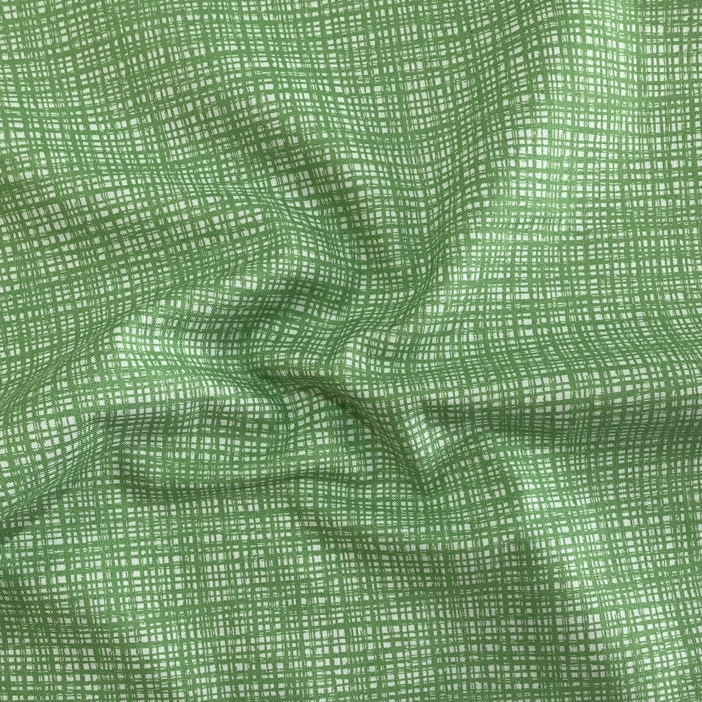 100% cotton quilting fabric — Intersecting bright green lines. 43/44in width.