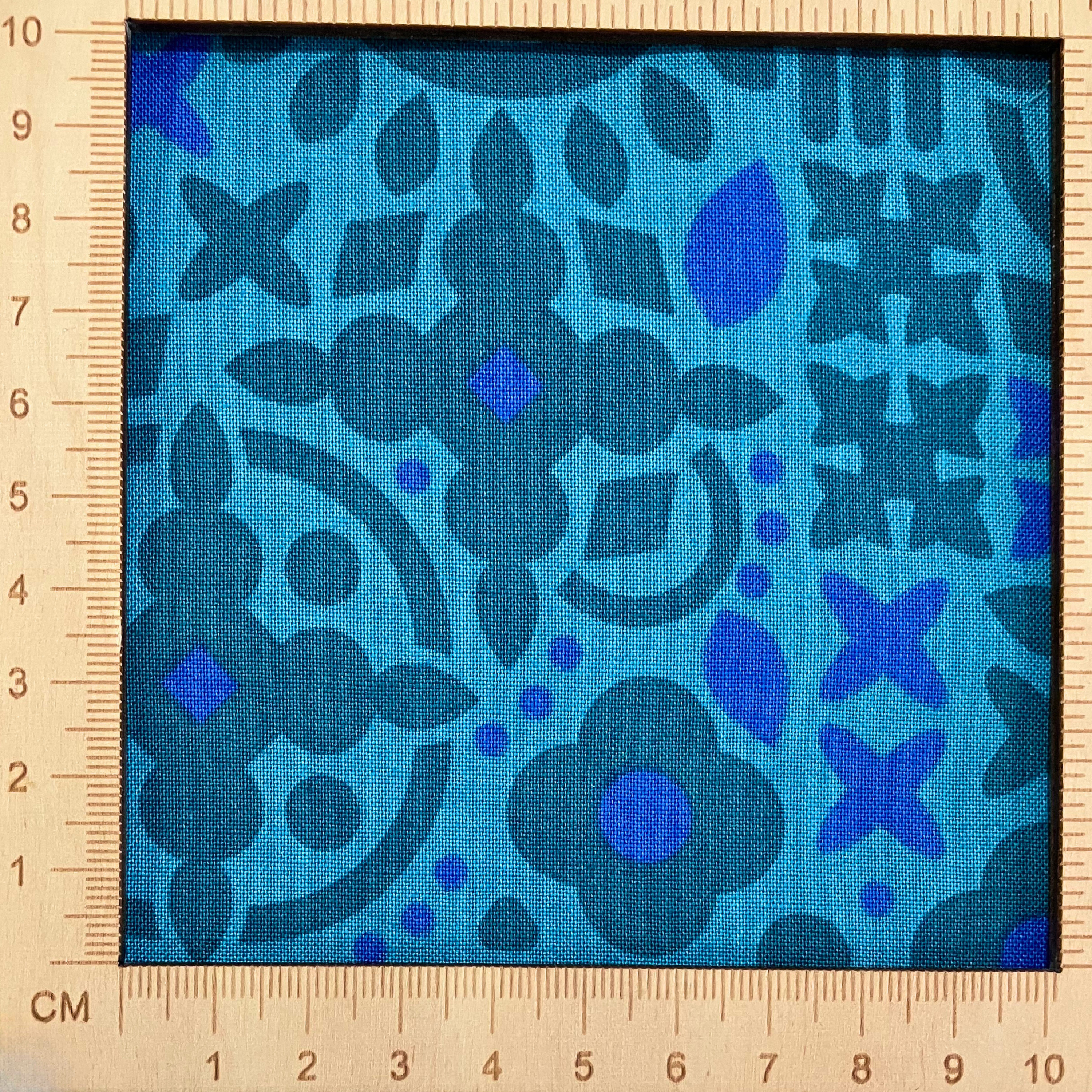 4"x4" scale — 100% cotton quilting fabric — dark turquoise and blue tonal geometric pattern to teal. 44in width.