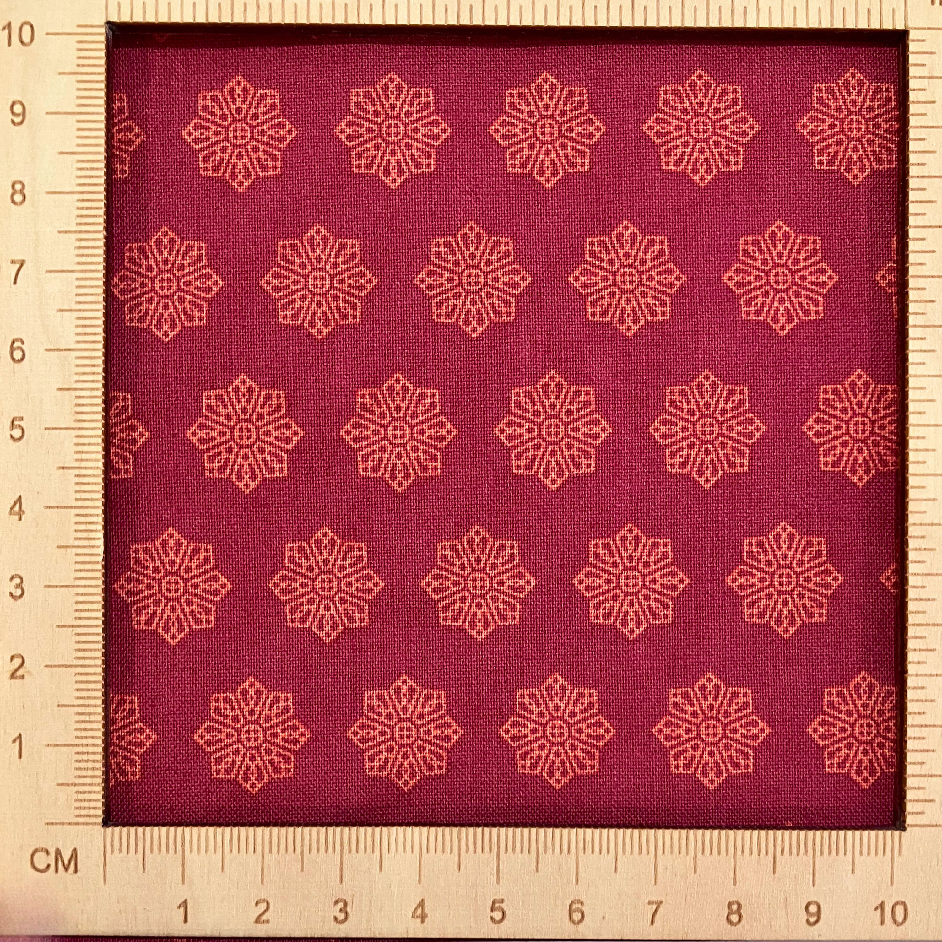 4"x4" scale — 100% cotton quilting fabric — Terracotta geometric tile pattern on red. 44/45in width.