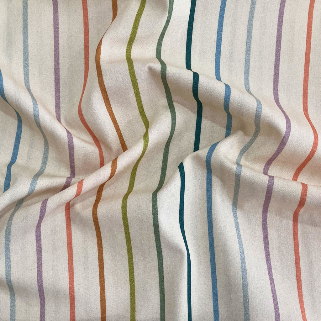 100% cotton quilting fabric — pastel vertical stripes on beige. 44/45in width.
