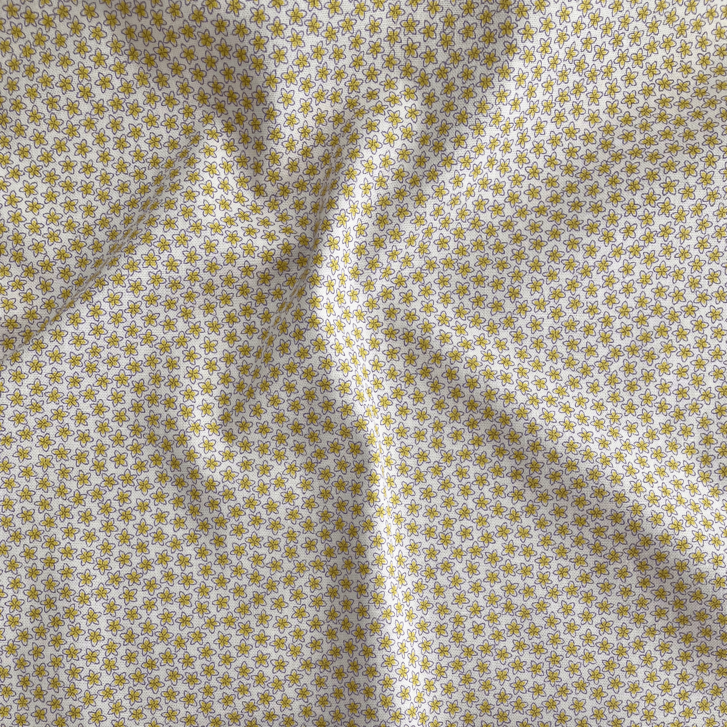 Liberty Fabrics Lasenby cotton — tiny yellow blooms on beige. 44/45in width.