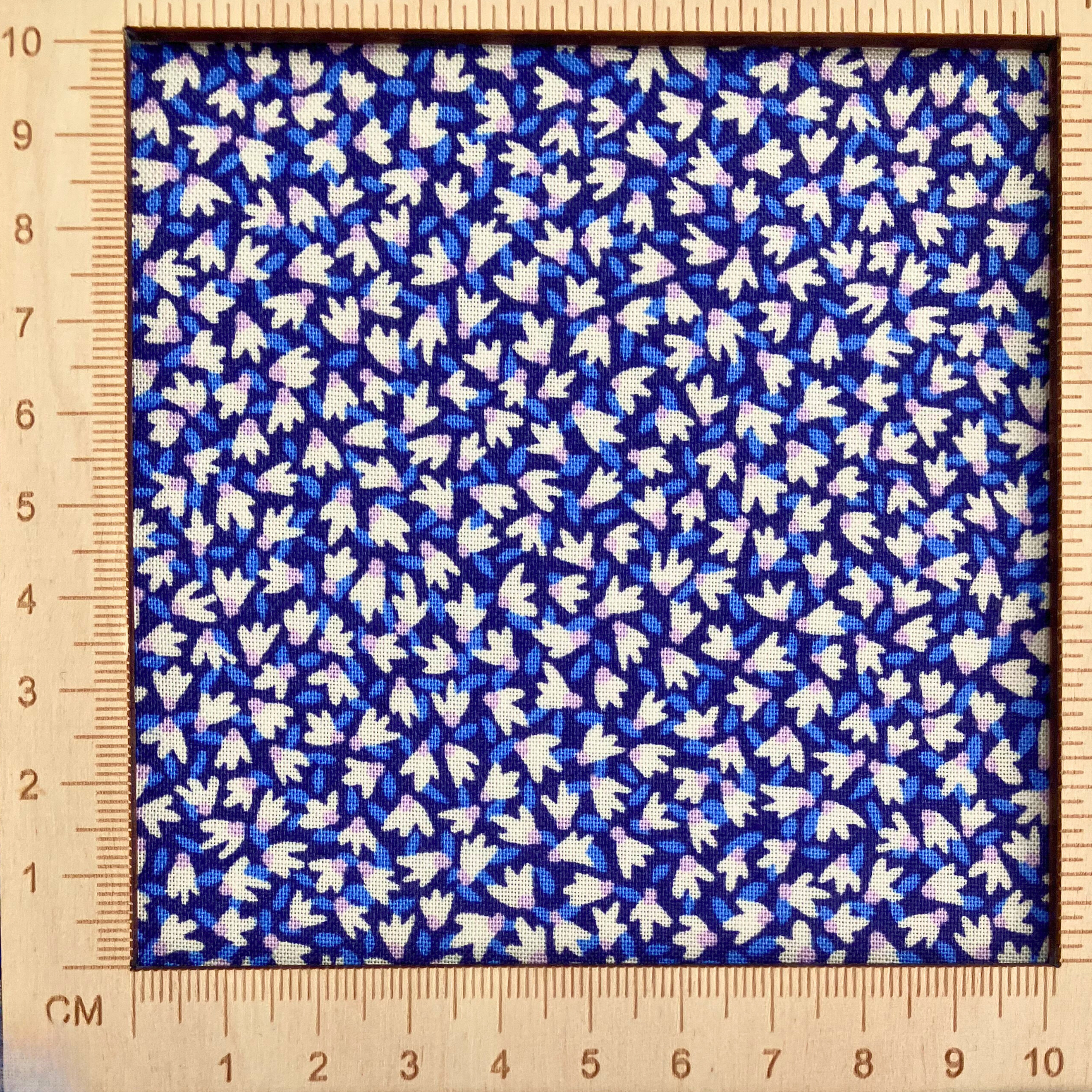 4"x4" scale — Liberty Fabrics Lasenby cotton — tiny white flowers on dark blue. 44/45in width.