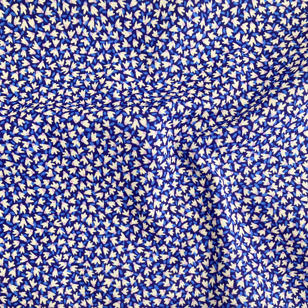Liberty Fabrics Lasenby cotton — tiny white flowers on dark blue. 44/45in width.