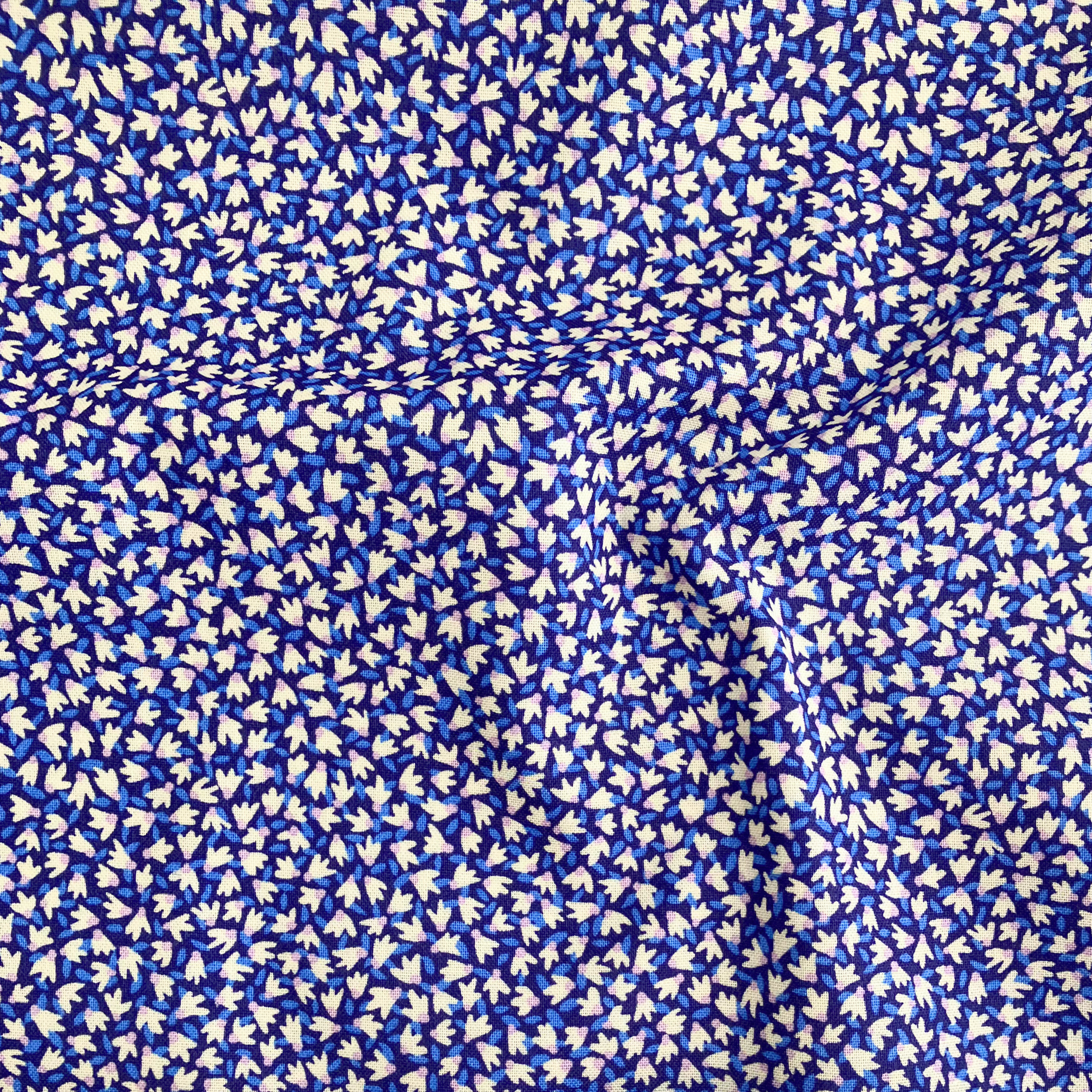 Liberty Fabrics Lasenby cotton — tiny white flowers on dark blue. 44/45in width.