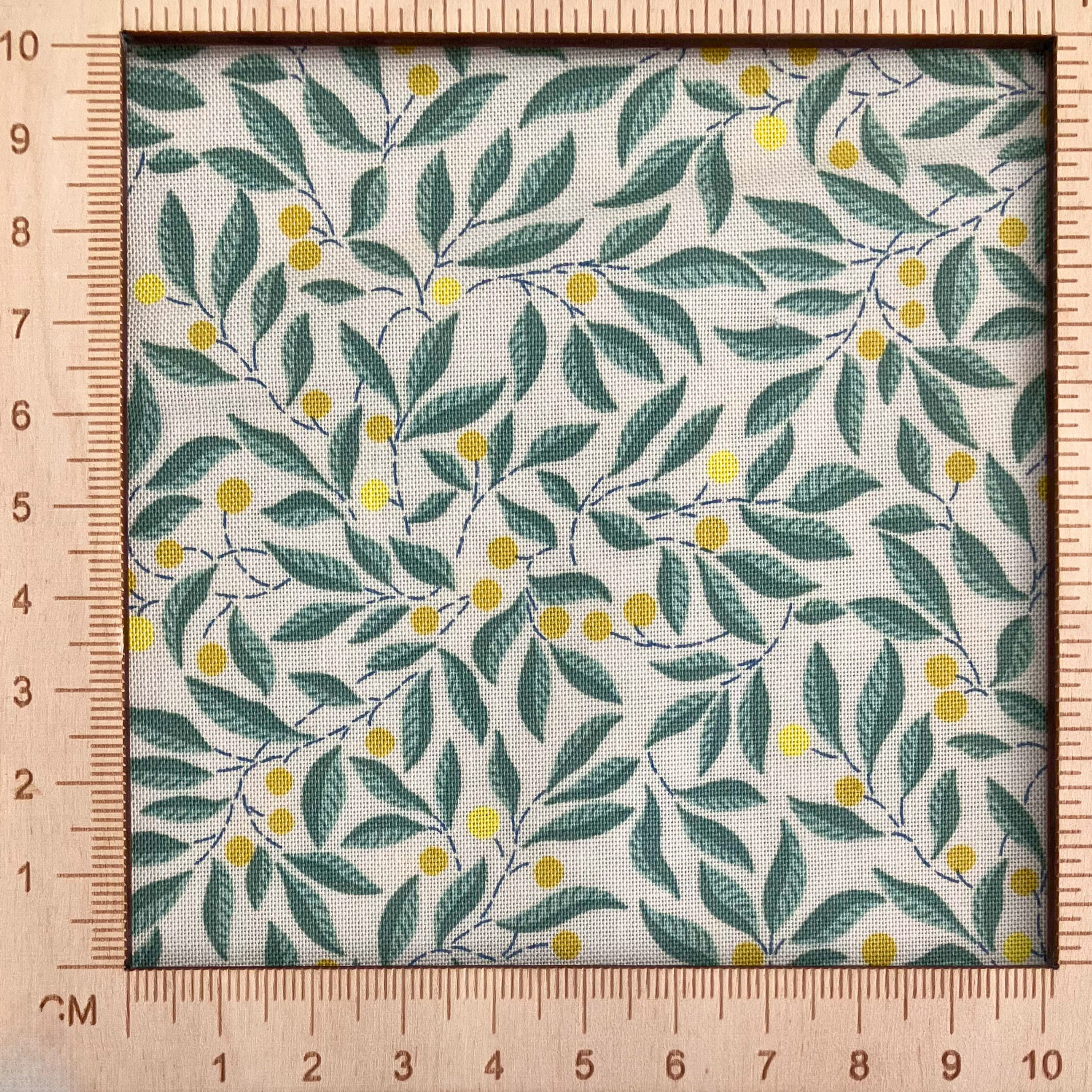 4"x4" scale — Liberty Fabrics Lasenby cotton — intertwining green leafy branches with yellow berries. 44/45in width.