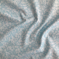 Liberty Fabrics Lasenby cotton — subtle tonal floral shadow pattern on light blue. 44/45in width.