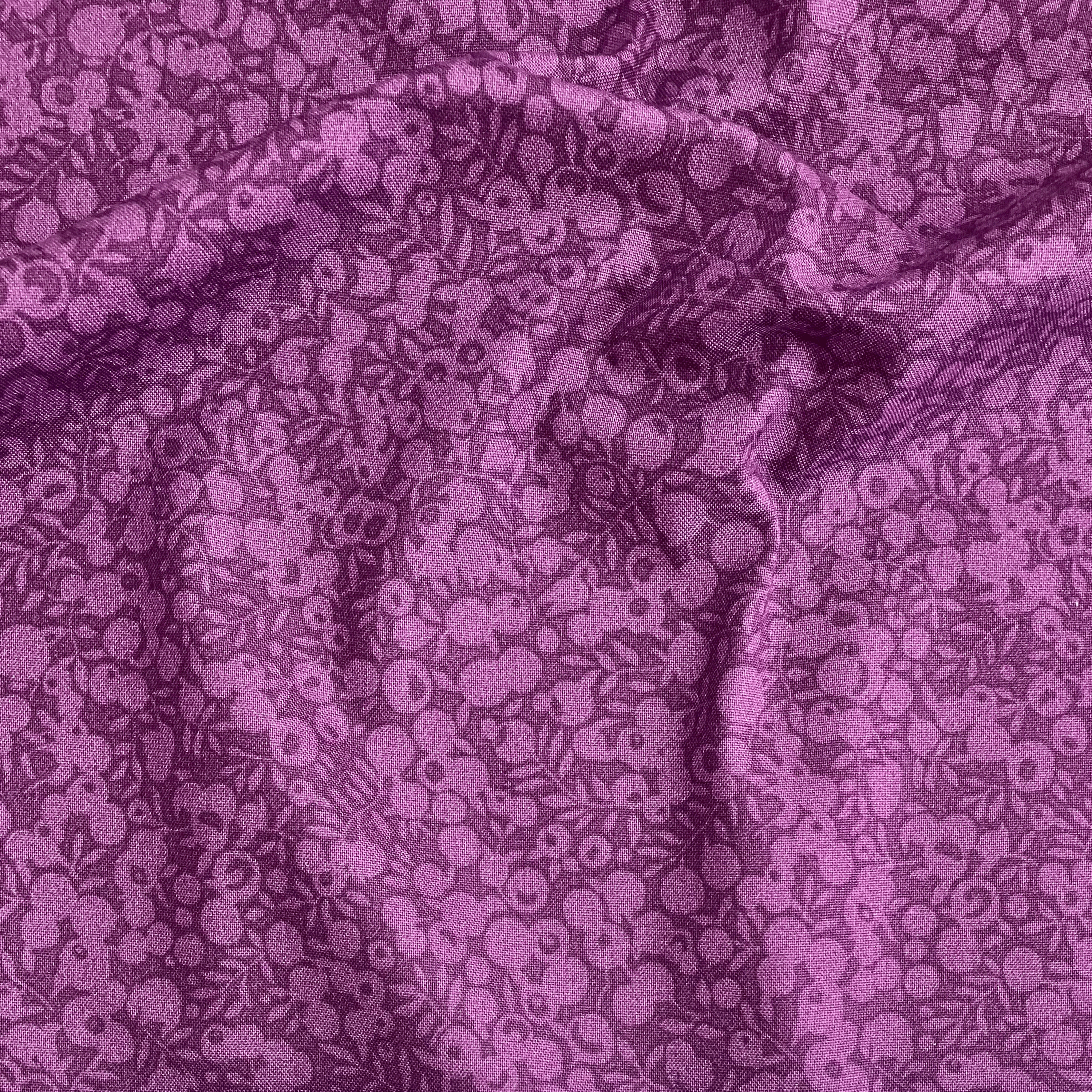 Liberty Fabrics Lasenby cotton — subtle tonal floral shadow pattern on deep purple. 44/45in width.