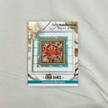 A counted cross stitch pattern card for 'Crab Dance' by Tiny Modernist Cross Stitch, featuring a finished sample of a red crab.