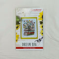 A counted cross stitch pattern card for 'Dream Big' by Tiny Modernist Cross Stitch, featuring a finished sample with central stitched design of birds on stacked books with flowers.
